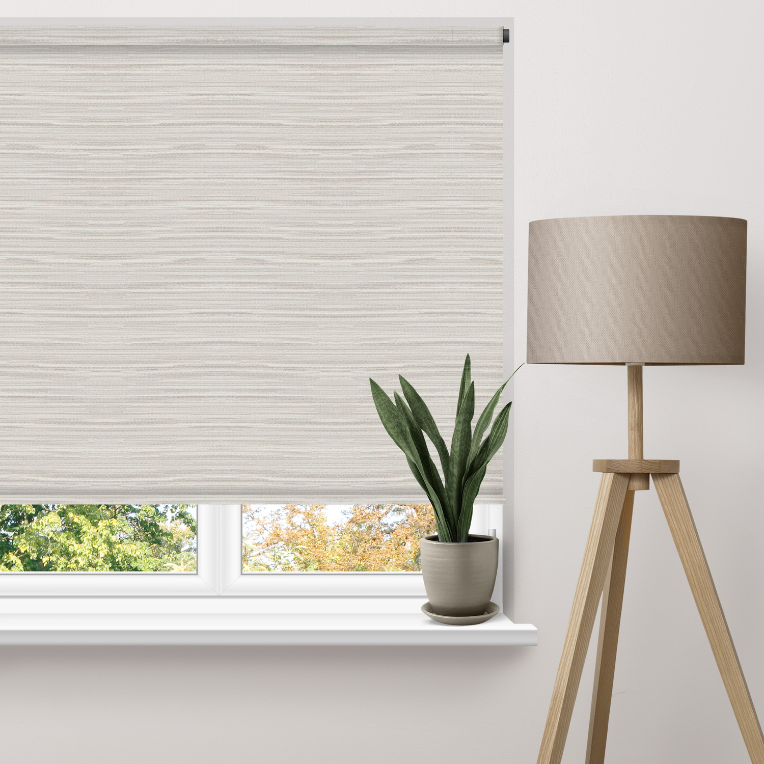 Motorised roller blind in a living room